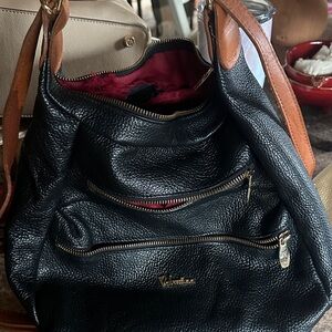 Vince Camuto Black Pebbled Leather Shoulder Bag with Tan Straps Small tear